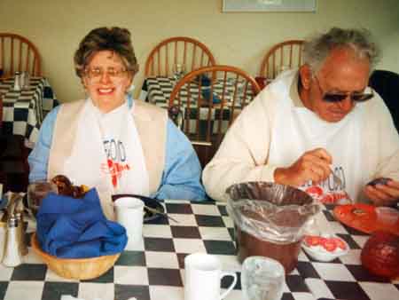 Disabled travelers in wheelchairs eat lobsters